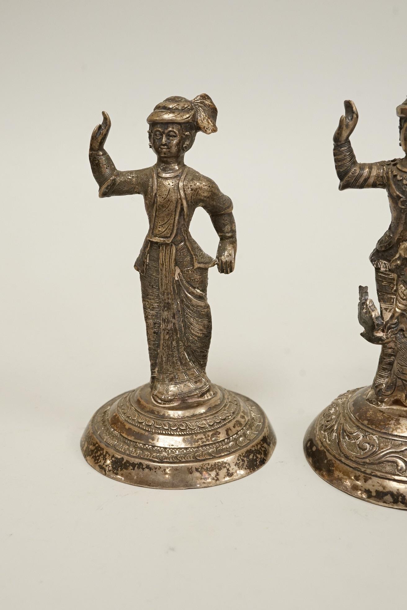 Four early 20th century Thai white metal figurines, 92mm et infra, 11.3oz.